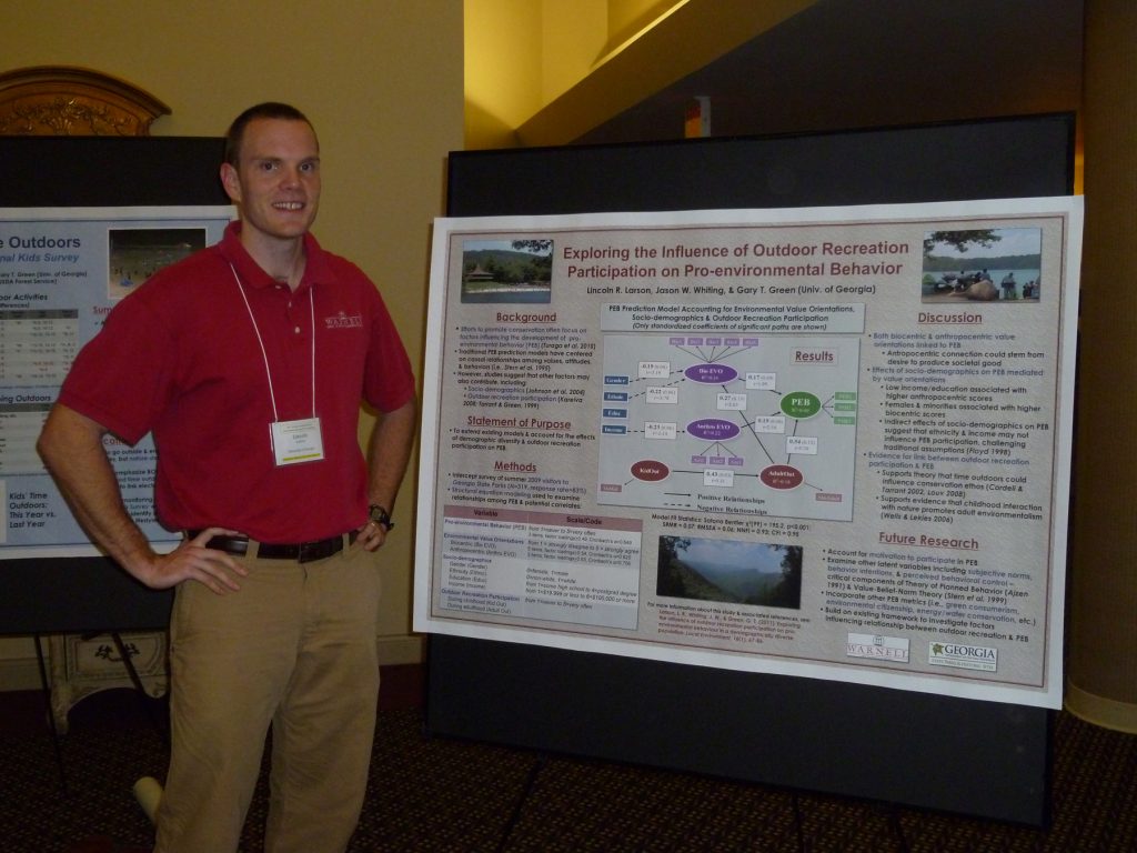 Lincoln with research poster - The Larson Lab @ NCSU - College of Natural Resources at NC State University