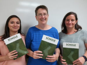 Mariela, Gwynn and Lauren with SCHOLE pamphlet - The Larson Lab @ NCSU - College of Natural Resources at NC State University